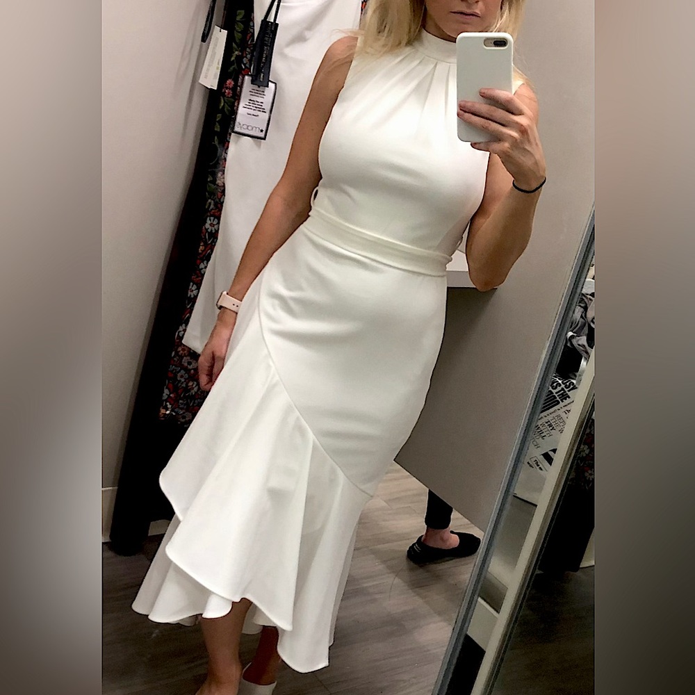 Gorgeous white midi ruffle dress perfect for a bride to be!